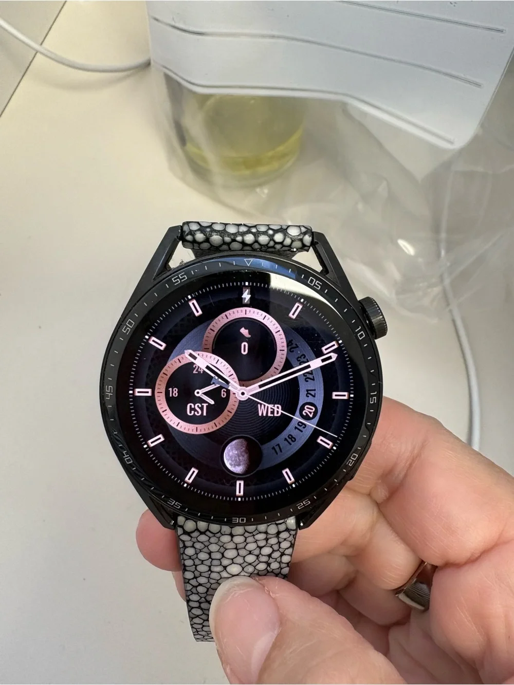 Huawei GT3 smartwatch with leather band and accessories